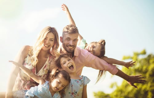 family with 3 young daughters