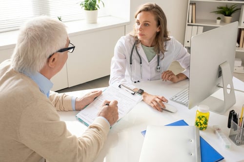 Doctor speaking with senior patient