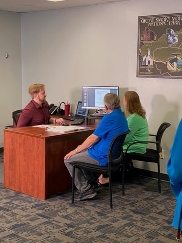 senior Medicare clients at TCU broker desk