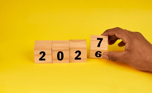wooden blocks with the year changing from 2026 to 2027 depicting upcoming changes